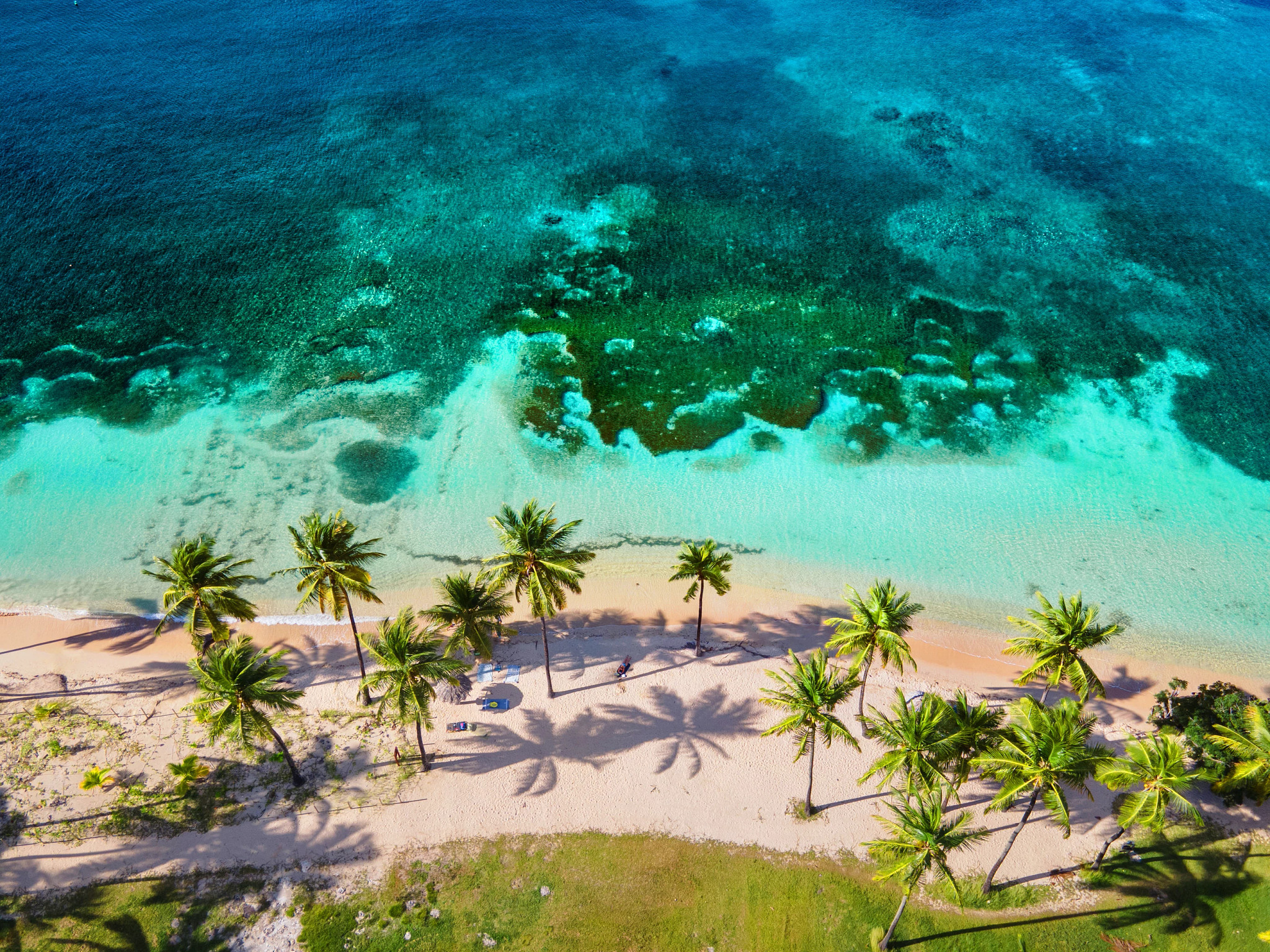 aerial photo of a beach on an island