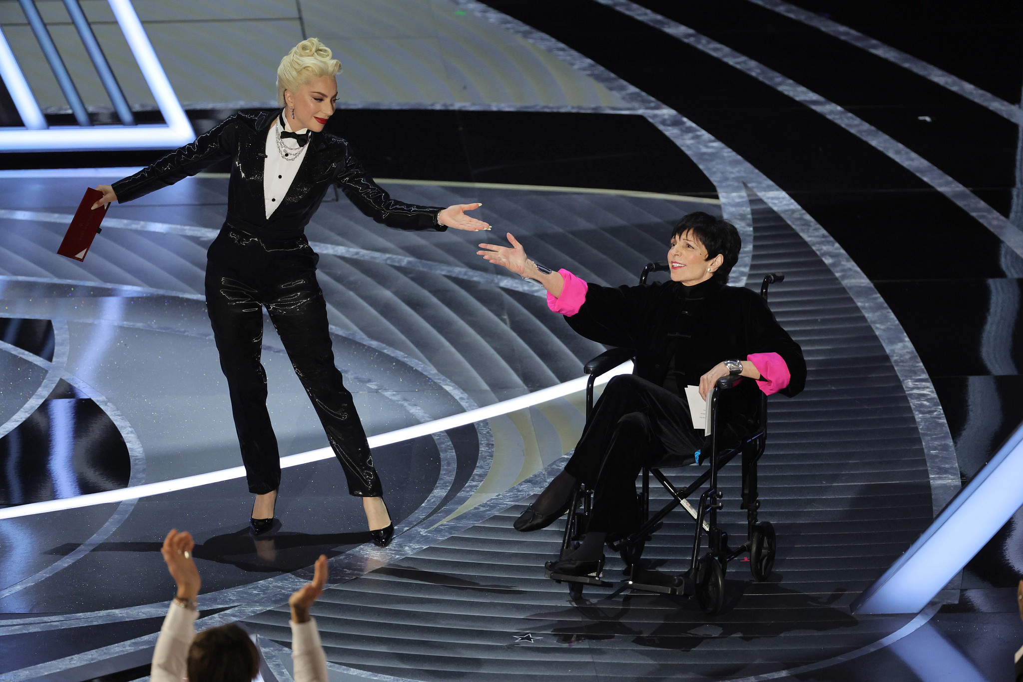 liza minnelli onstage with lady gaga at the academy awards in 2022