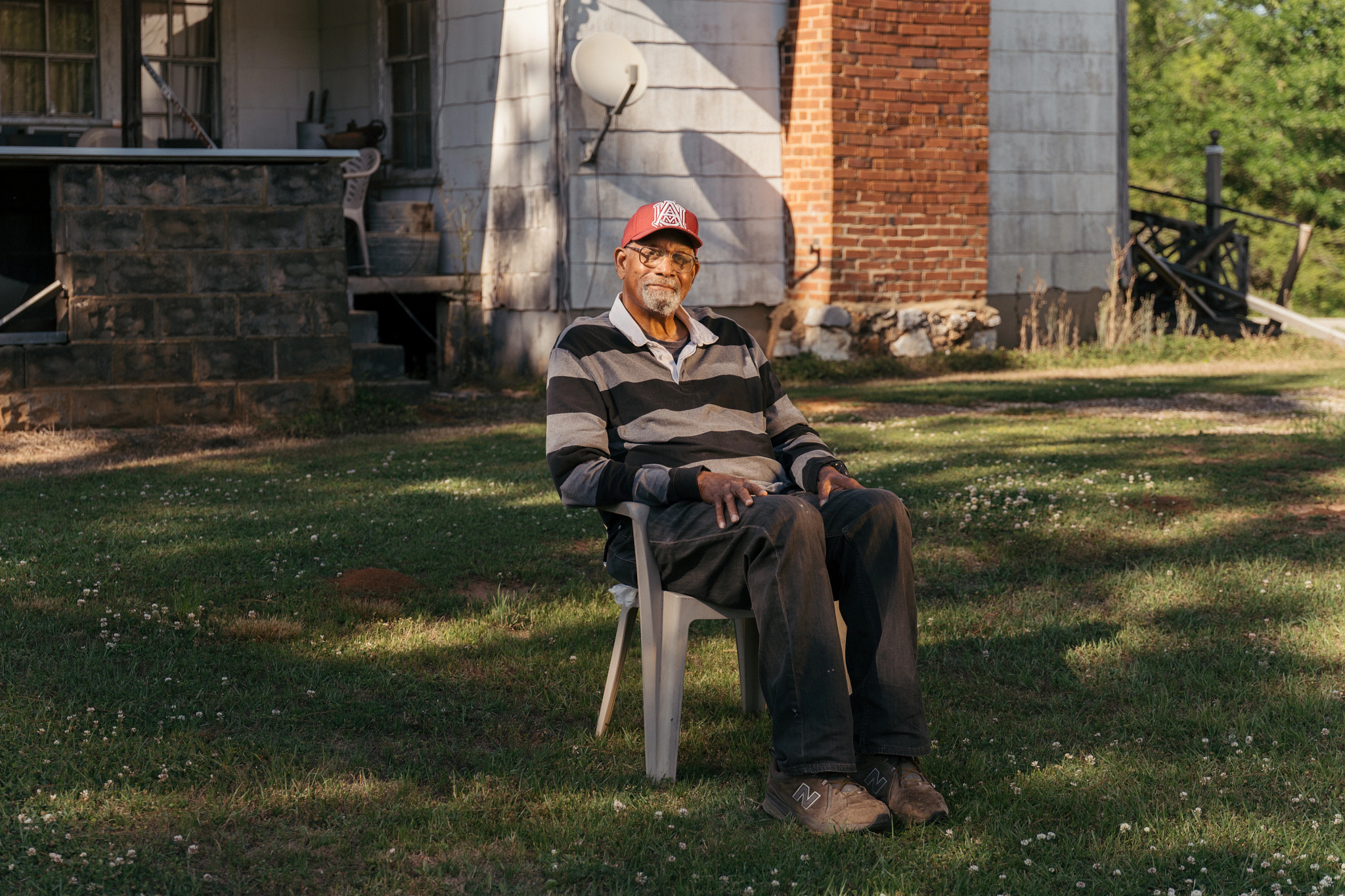 a farmer sitting in a chair
