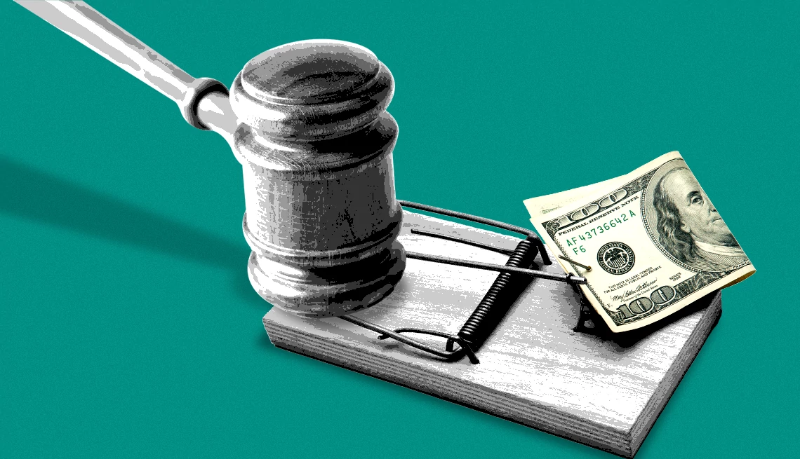 AARP backs crackdown on paycheck advance loans a one hundred dollar bill sits on a mousetrap. a courtroom gavel springs the trap.