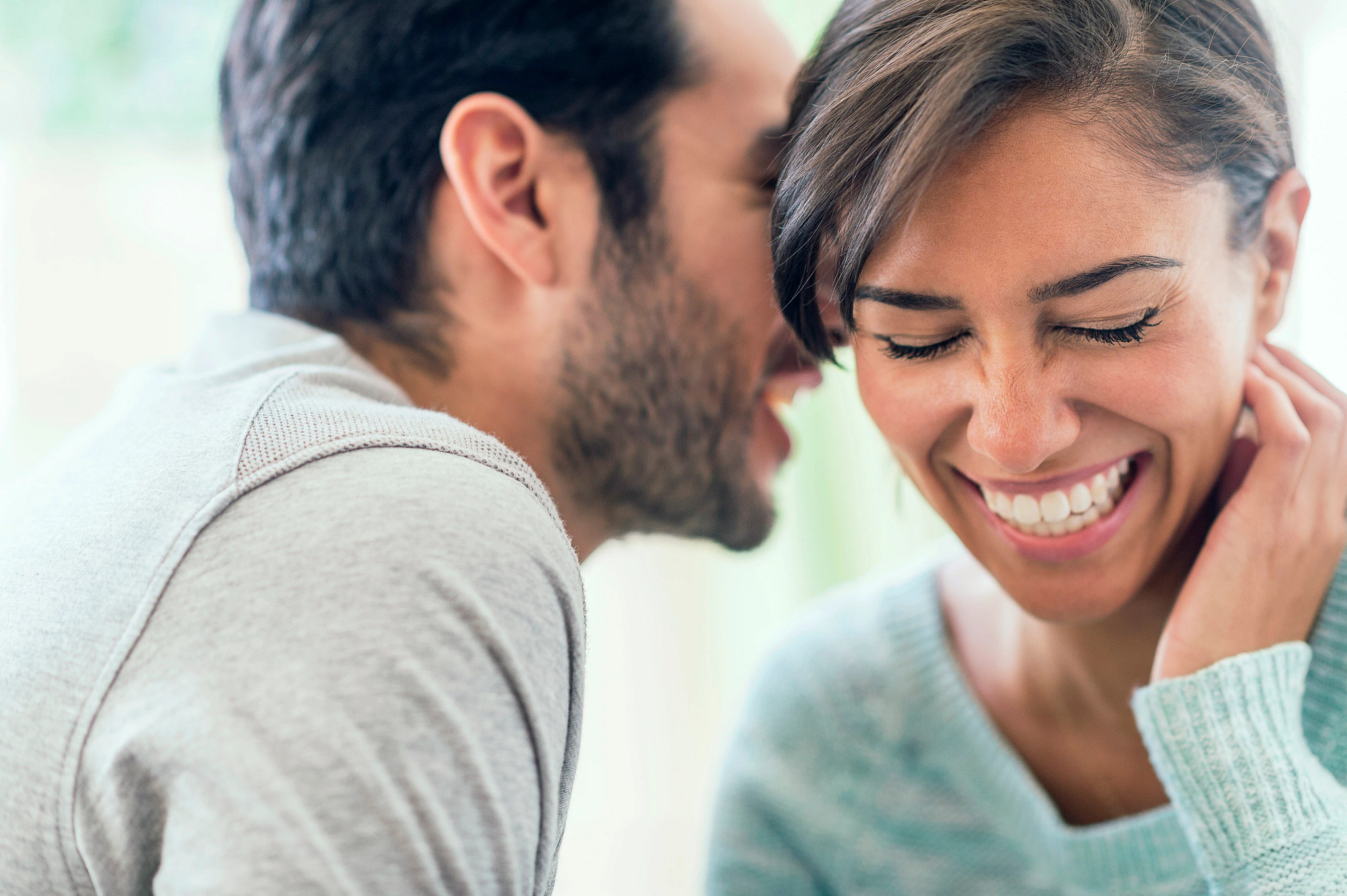 An image depicting a man over 40 speaking with a woman.