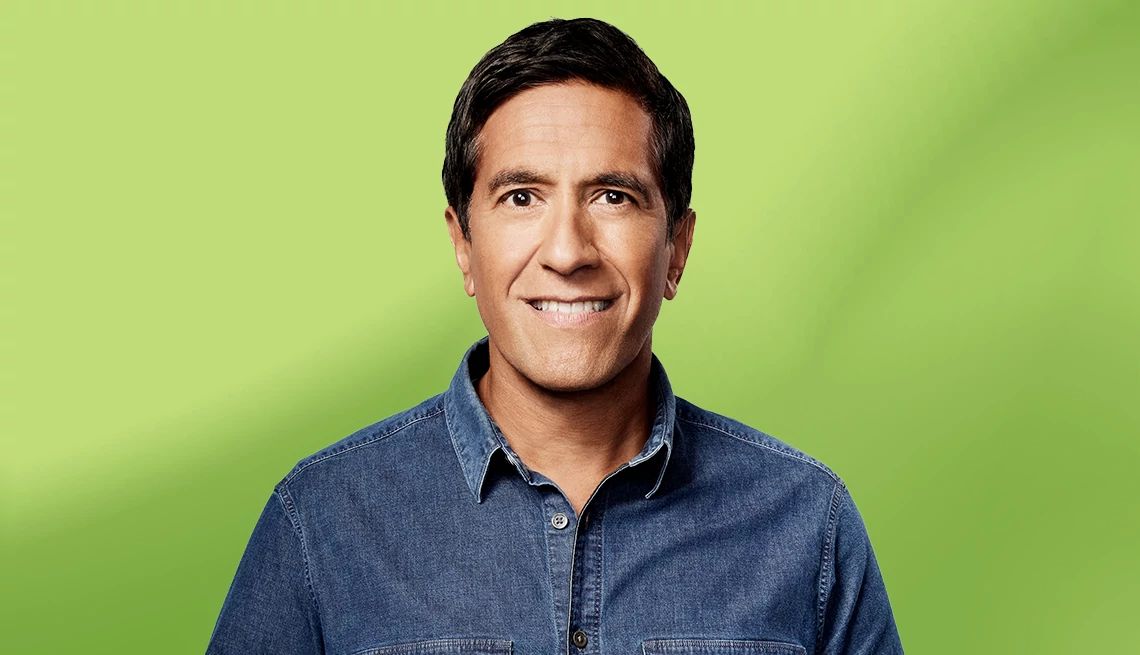 Sanjay Gupta, M.D. interview Sanjay Gupta against green ombre background