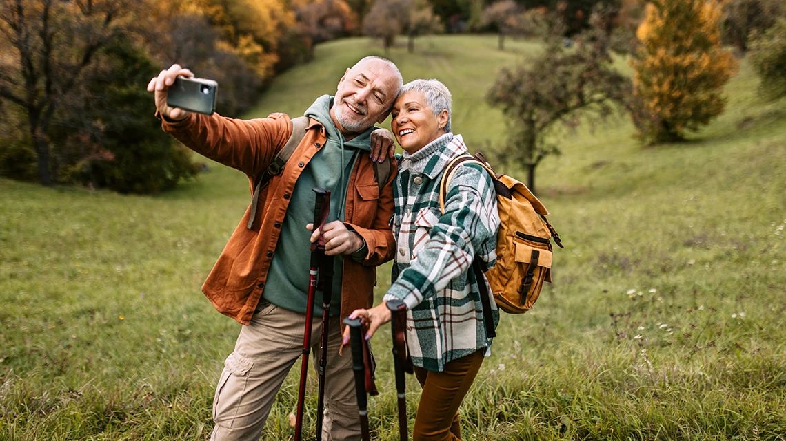 Senior couple taking a selfie.