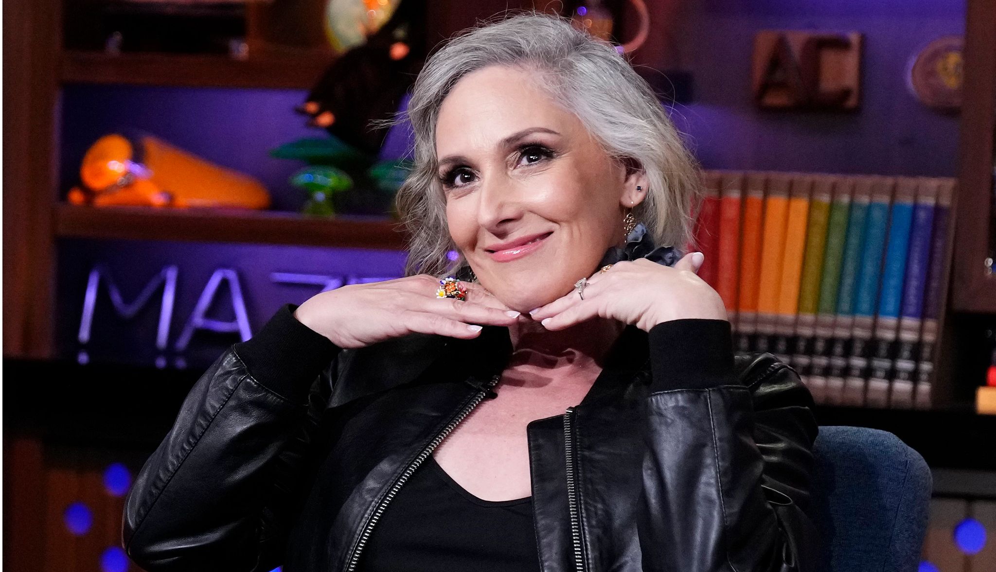 Ricki Lake Debuts Facelift After Major Weight Loss ricki lake smiling and holding her hands beneath her chin