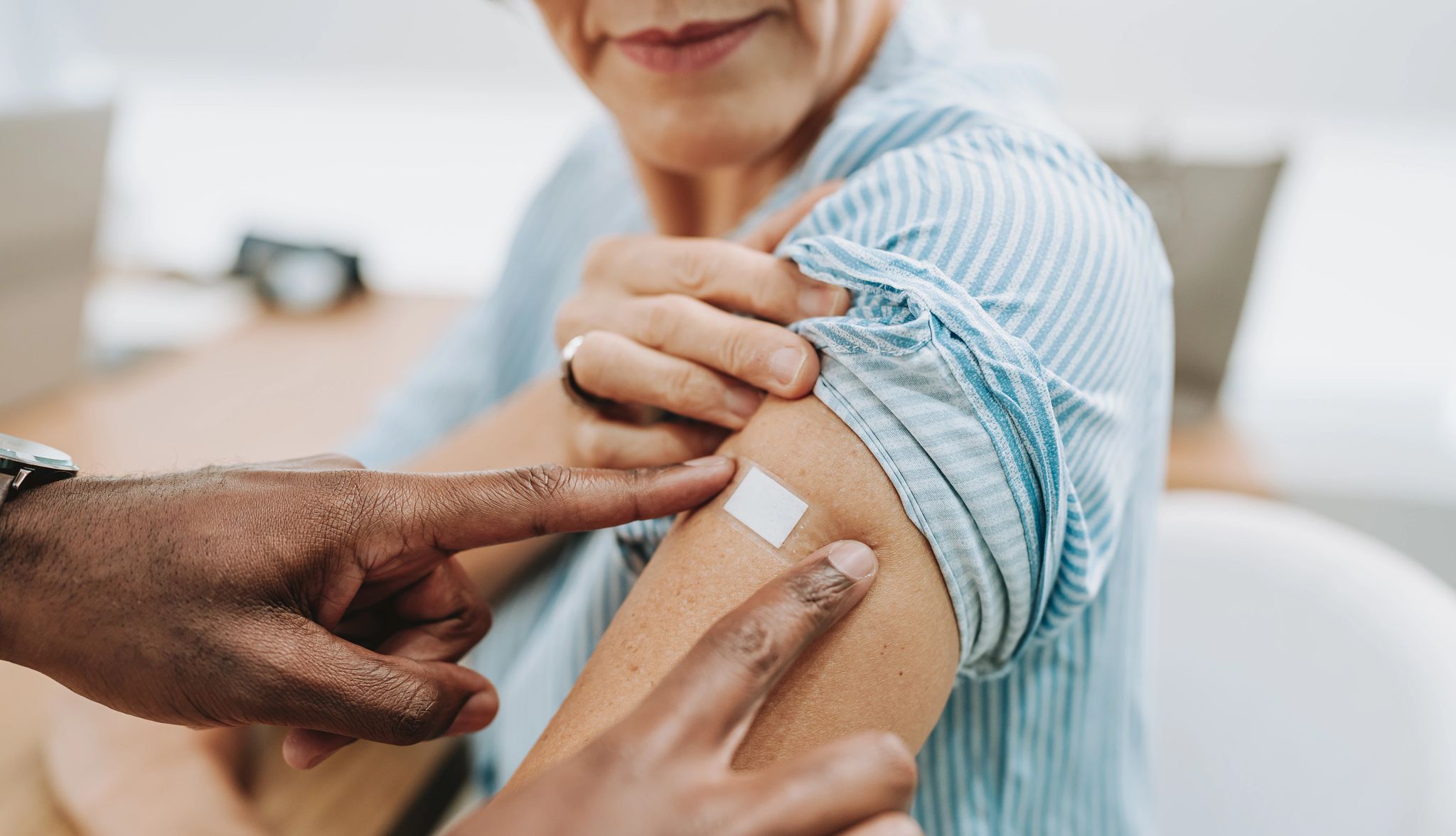 Vaccine Smart Guide bandaid on arm
