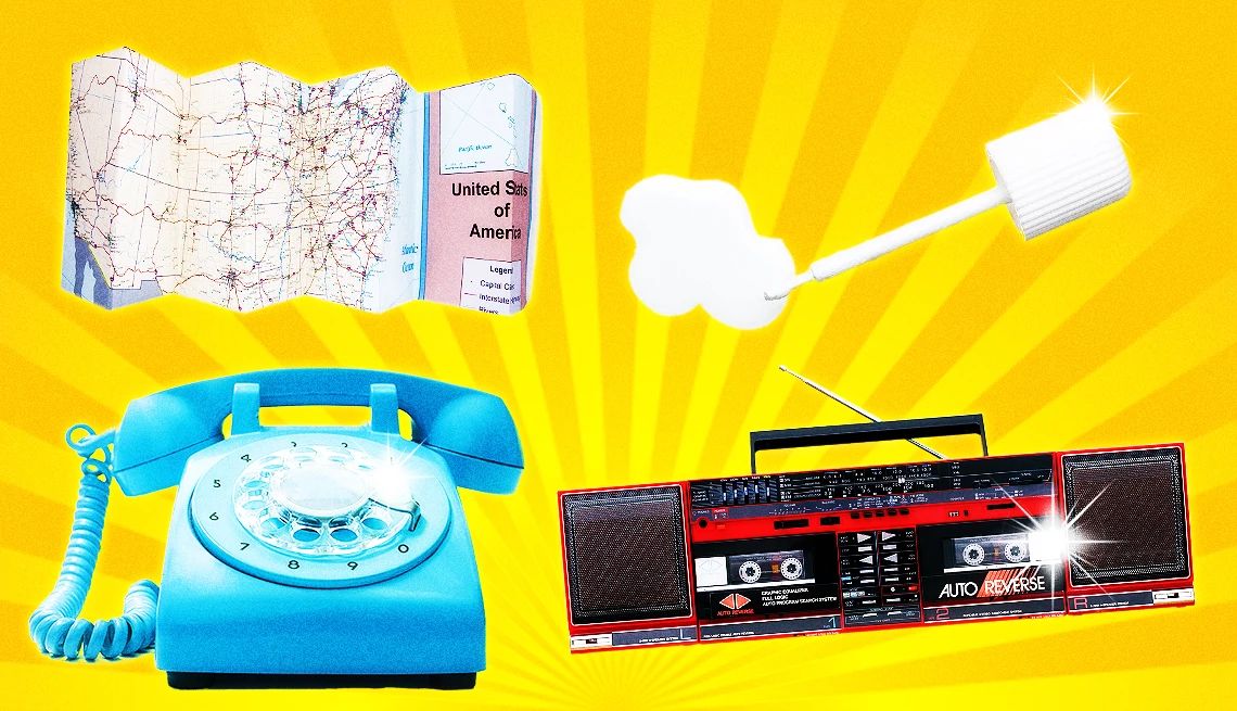 Useless Skills From Your Boomer and Gen X Childhood a paper map rotary phone white out and a boombox