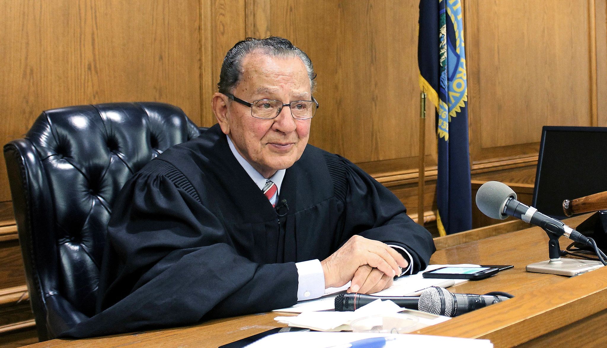 Frank Caprio, a Compassionate Judge Who Drew a Huge Online Audience, Dies at 88 judge frank caprio in his judicial robes sitting on the bench