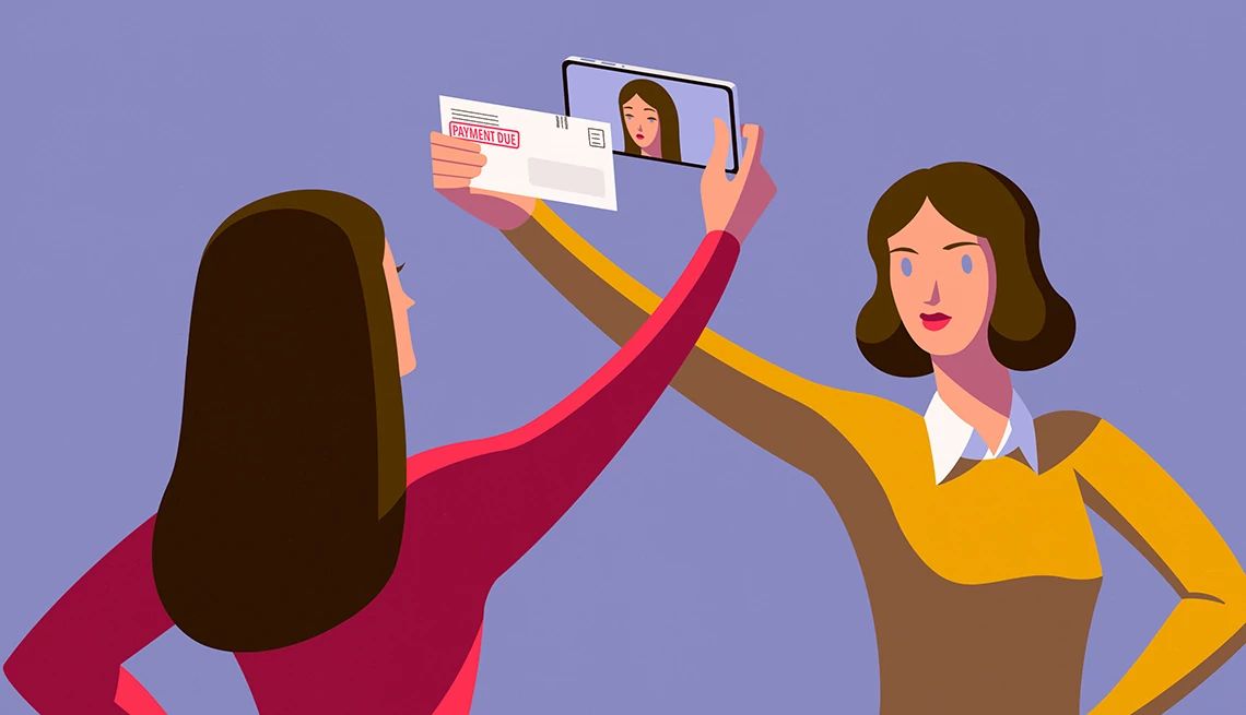 We’re Ready to Kick Our Daughter Off Our Cellphone Plan a person holding a phone while the other person holds the bill