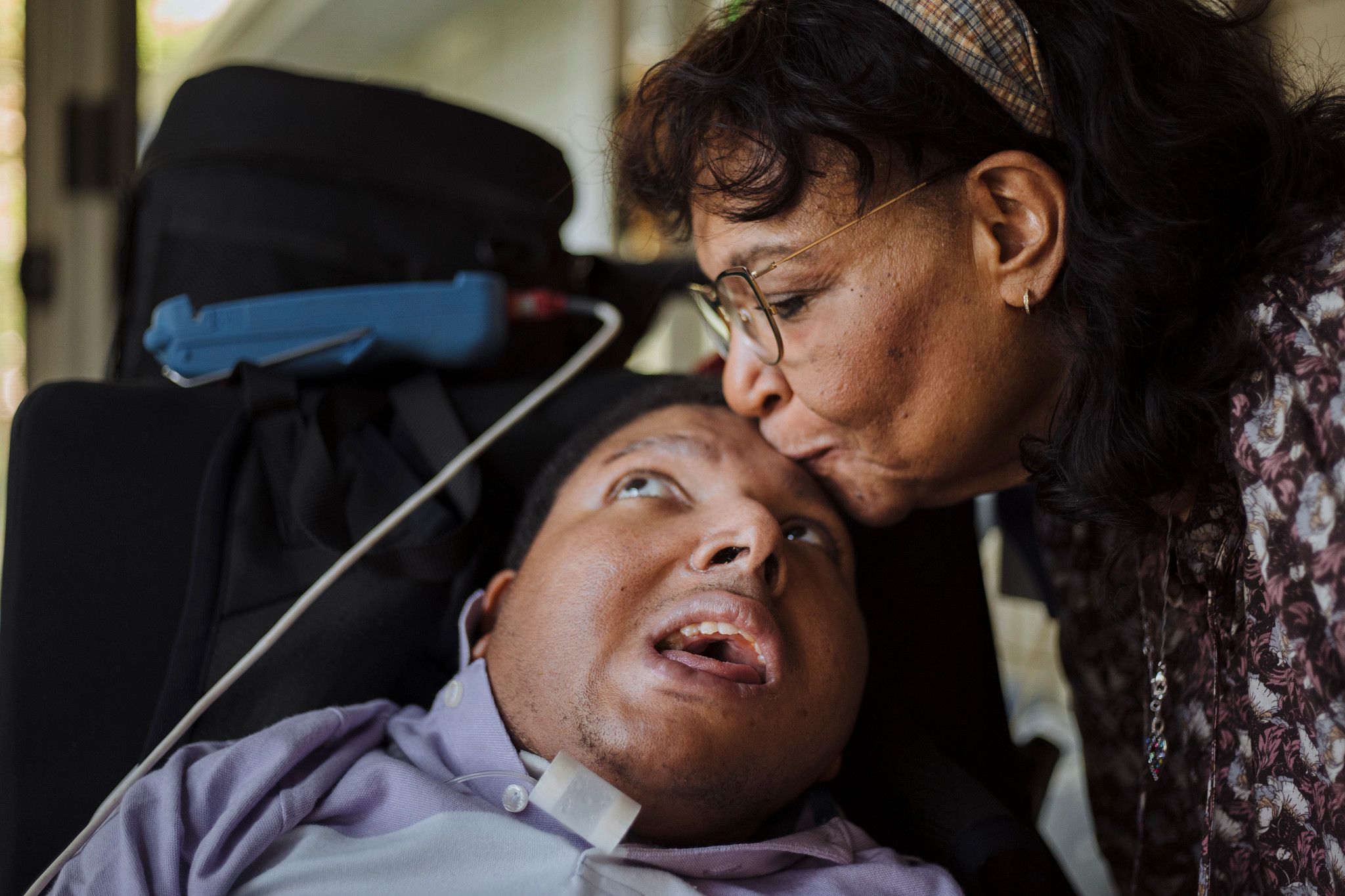 a mother caring for her son