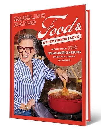 Cookbook 'Food & Other Things I Love' by Caroline Manzo Cookbook that says Caroline Manzo, Food and Other Things I Love, more than 100 Italian American recipes from my family to yours; Caroline Manzo stirring something in pot on stove on cover
