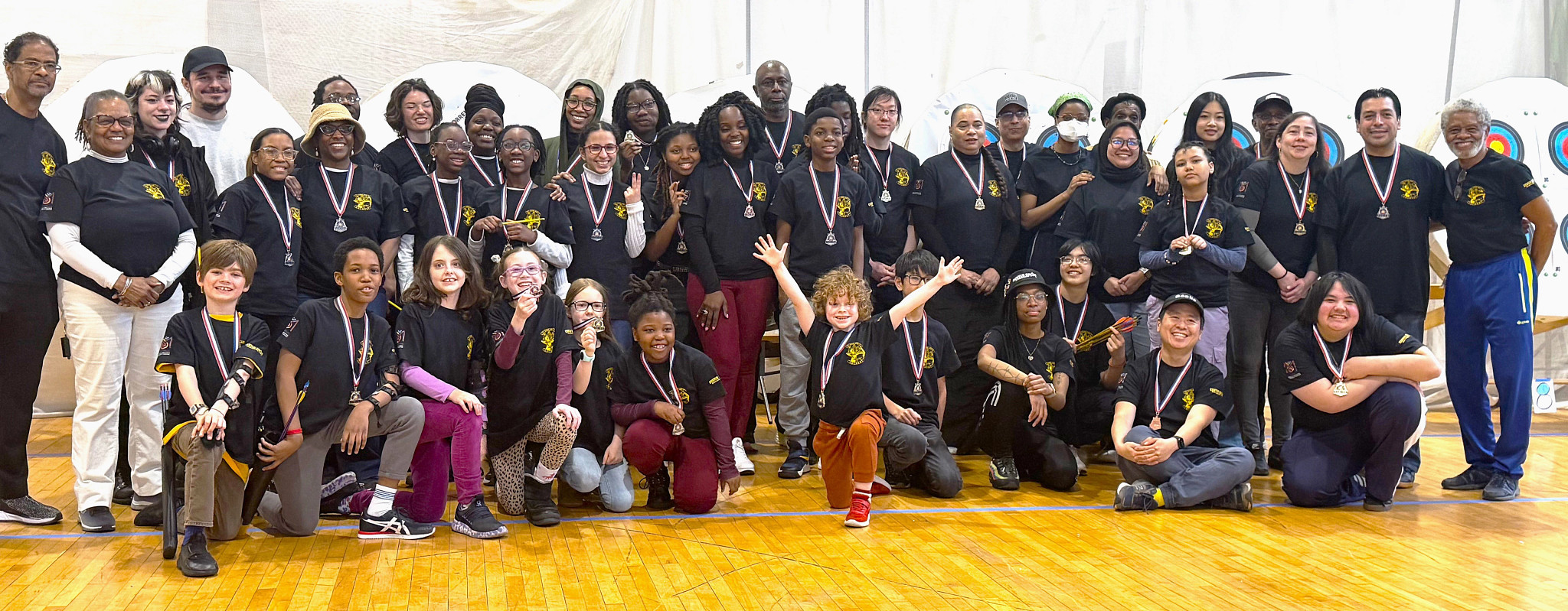 Center Shot Archers gather to celebrate at a recent archery tournament in New York