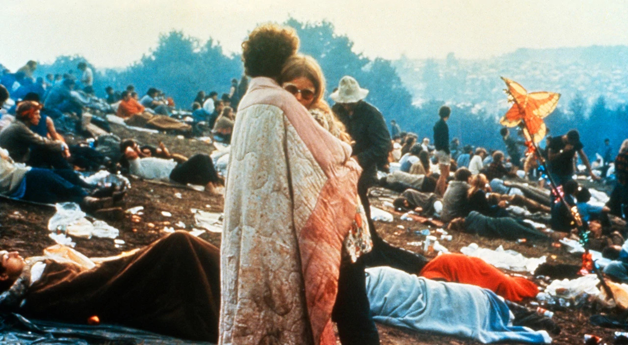 Couple embracing at the Woodstock Festival, USA 1960s