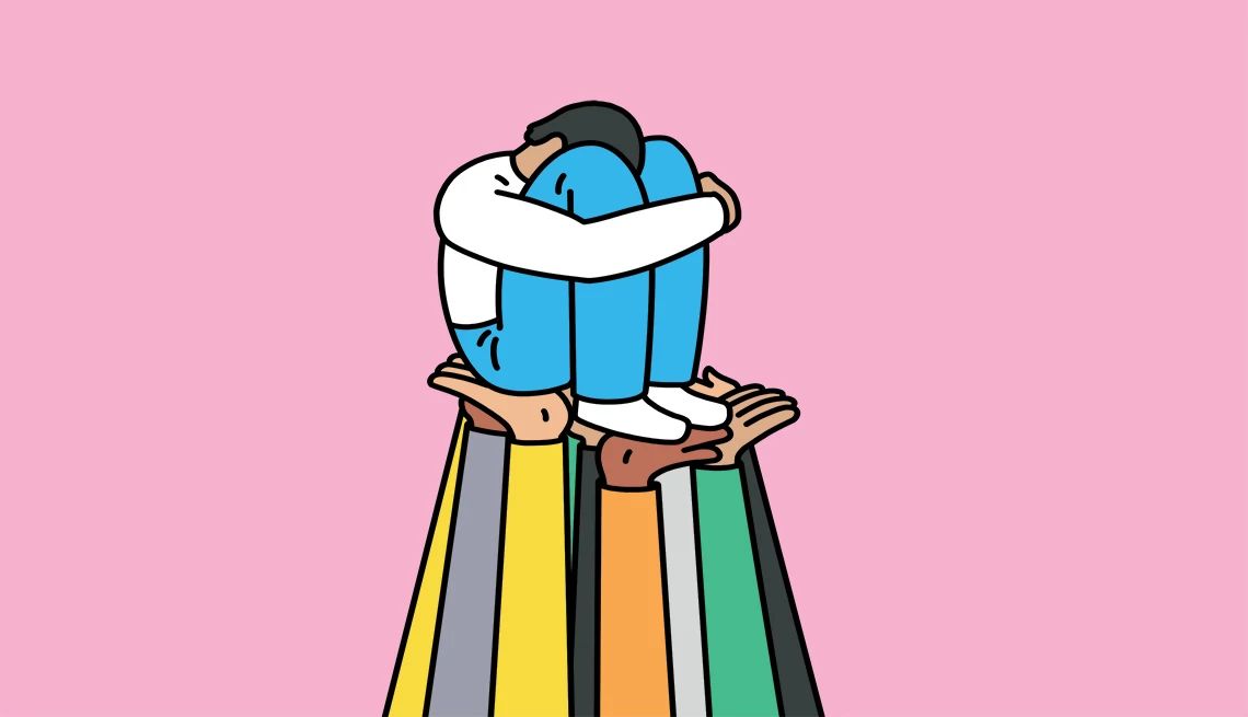 Seek solace in support groups Illustration of person with head in knees being held up by a bunch of hands