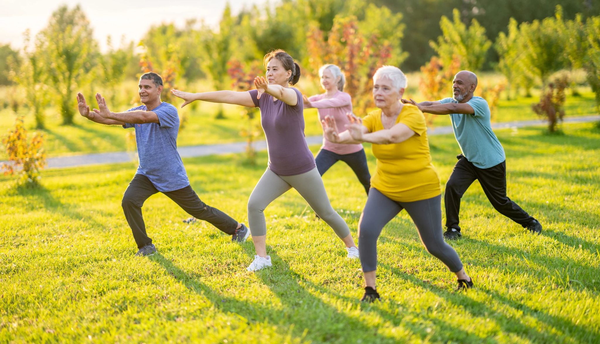 Tai Chi Benefits group of people doing tai chi