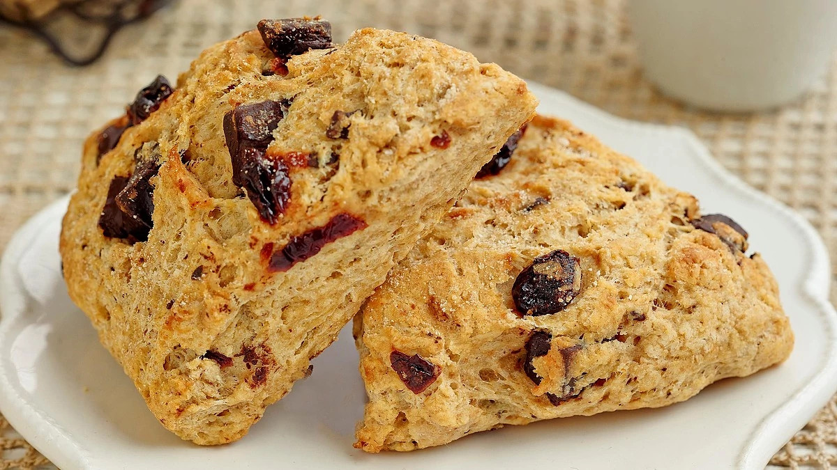 A close-up view of chocolate-cherry scones on a plate