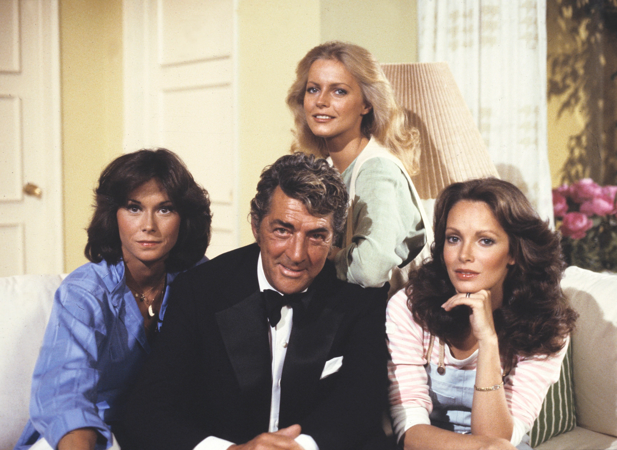 kate jackson and cheryl ladd with dean martin in a scene from an episode of charlies angels