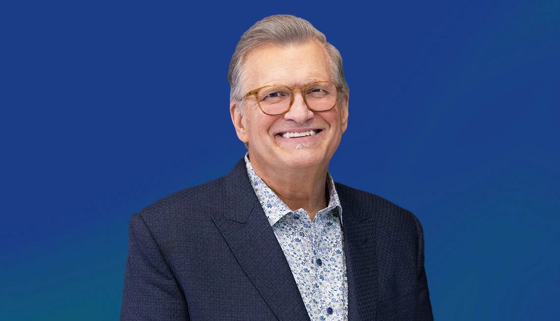 Drew Carey interview Drew Carey against blue background