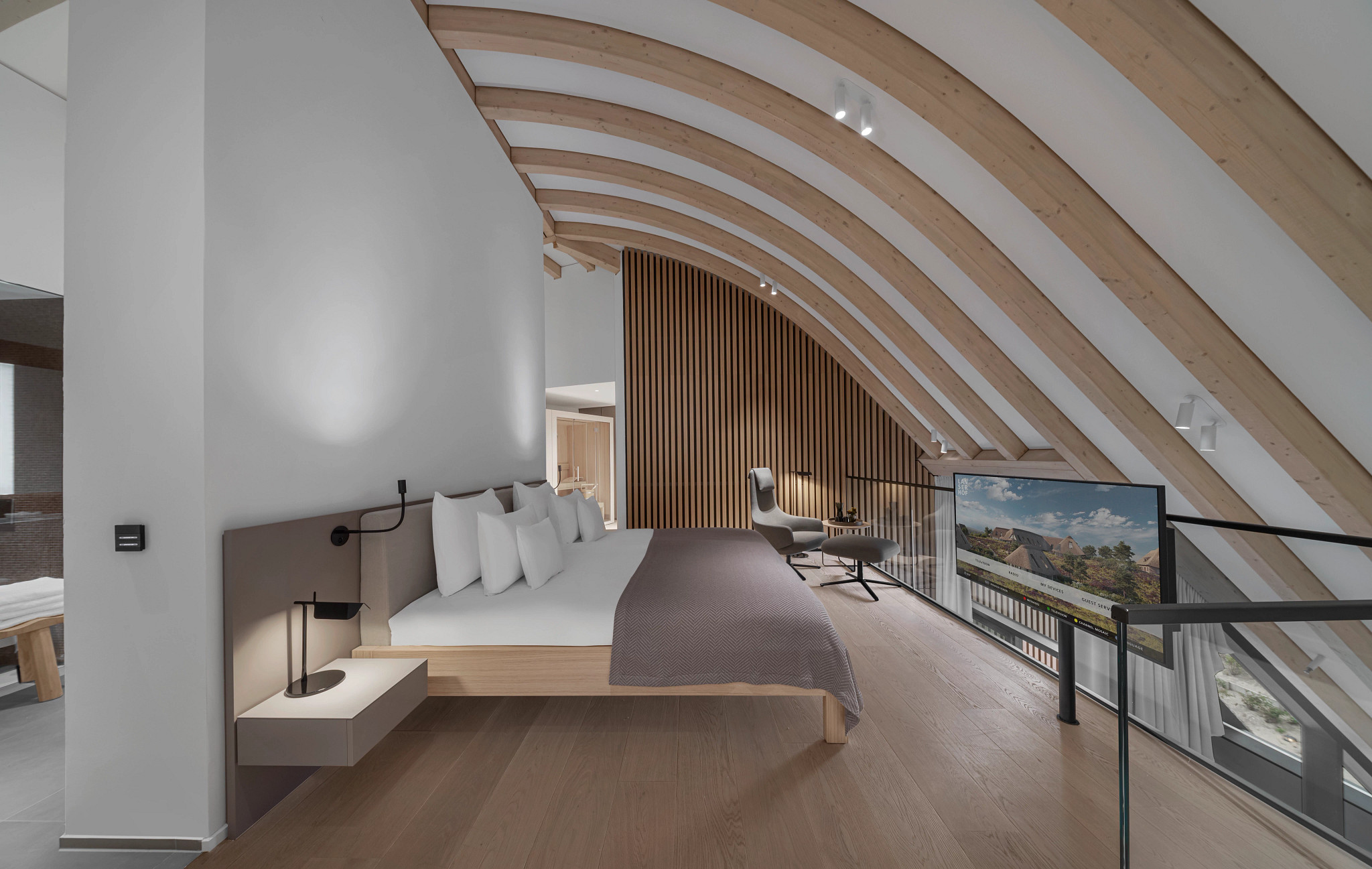 a hotel room in shades of white, gray and beige