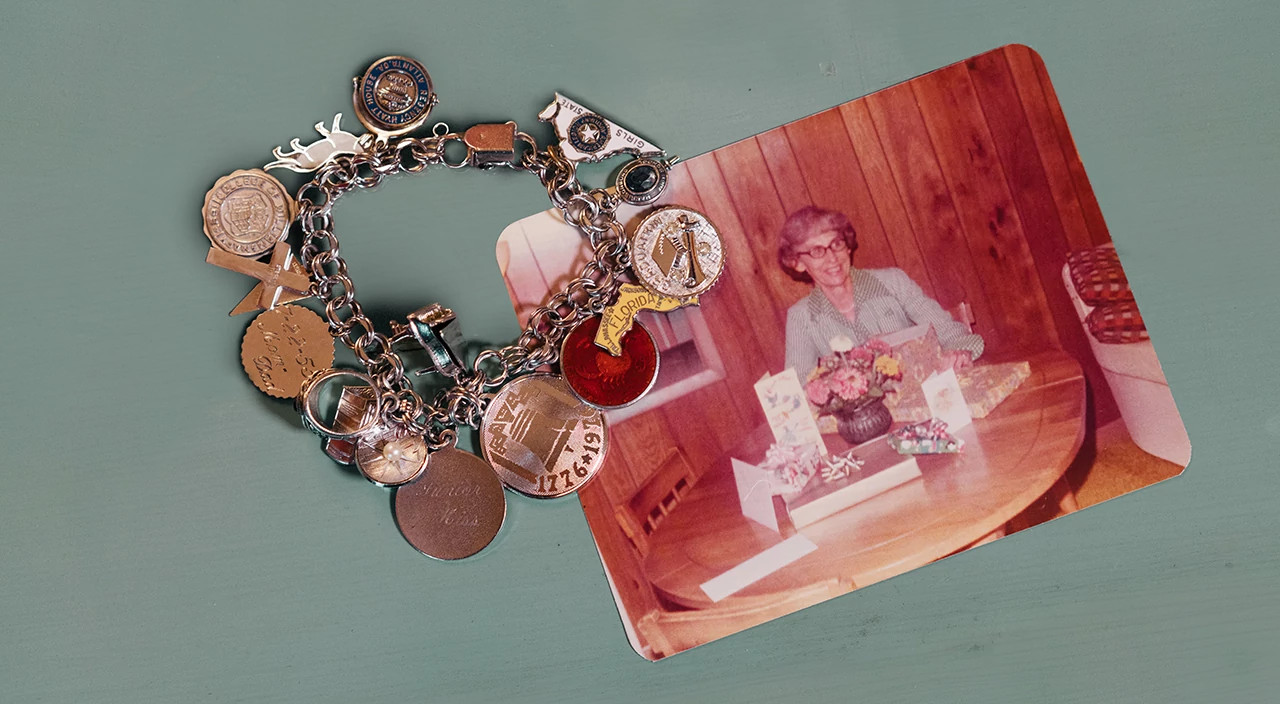 Charm bracelet and photo of Mom