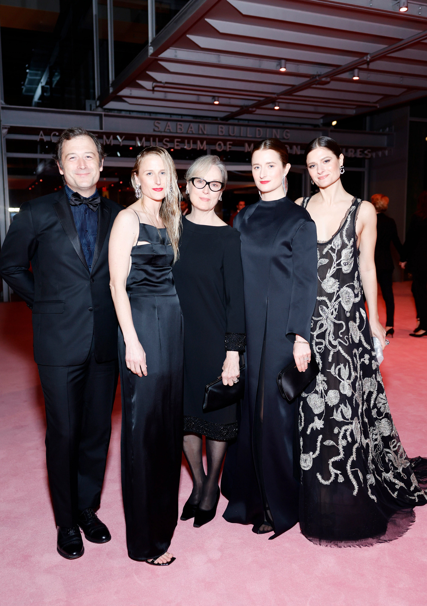 meryl streep posing with her four adult children