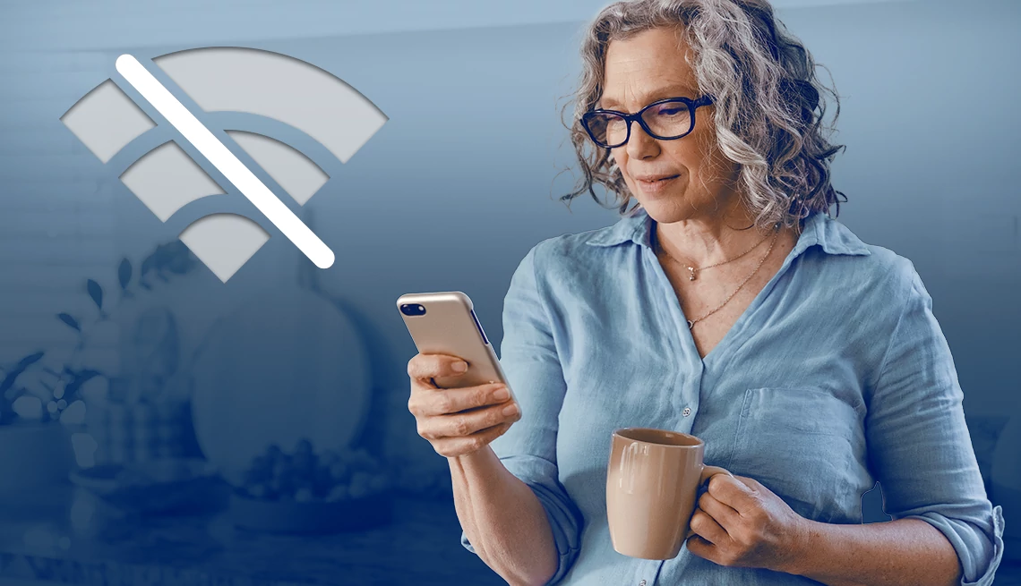 a woman looking at her phone with a no wi fi signal next to her