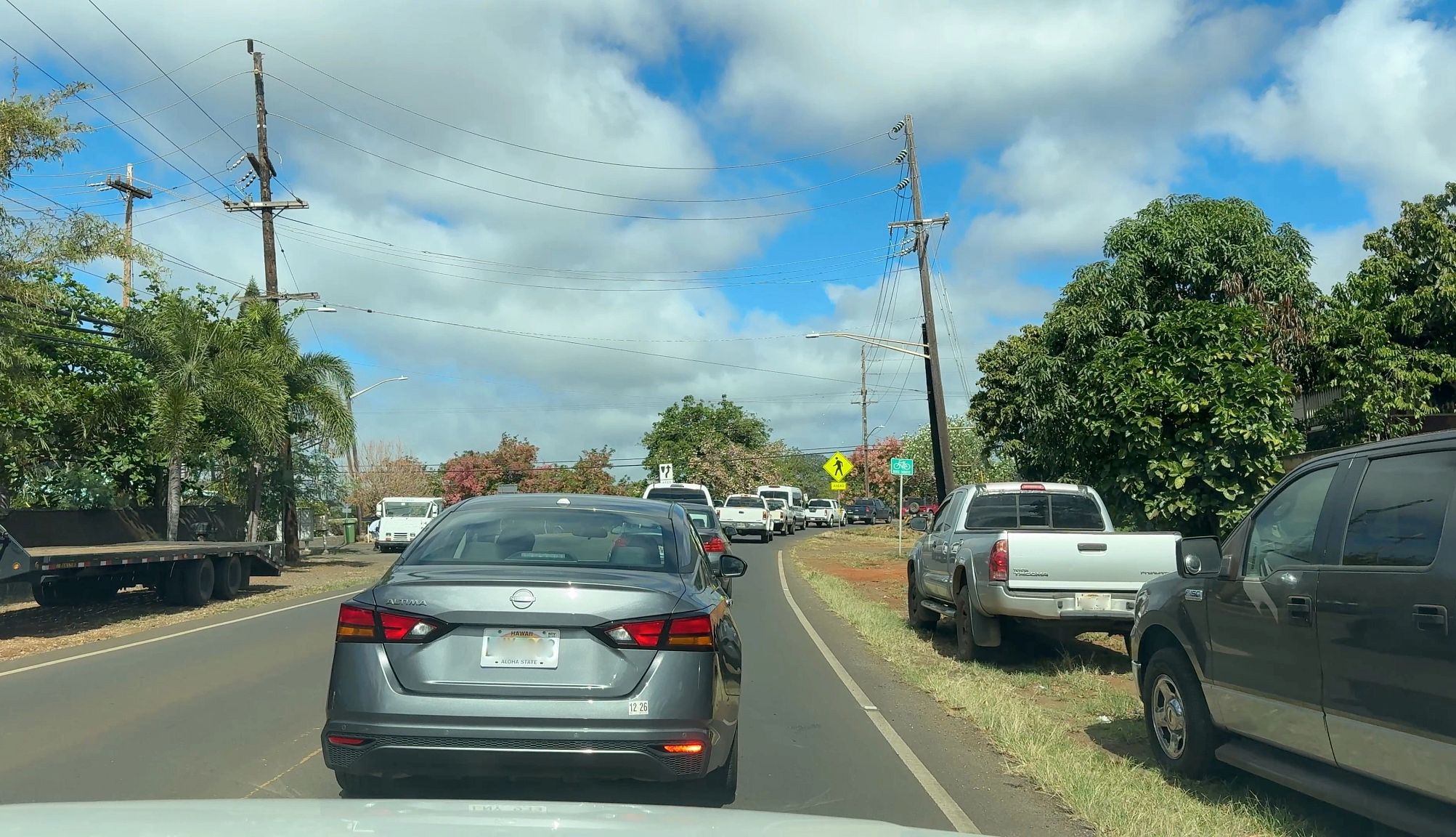 Tsunami Evacuation First Person Cars backed up on a street
