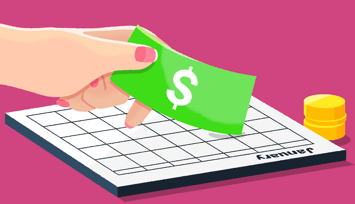 a hand holds paper cash over a calendar of the month of january