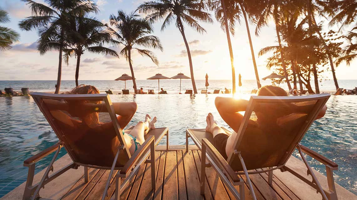Travel Savings, Discounts and Offers for AARP Members luxury travel, romantic beach getaway holidays for honeymoon couple, tropical vacation in luxurious hotel