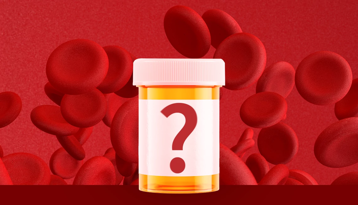Blood Thinners pill bottle with red blood cell background