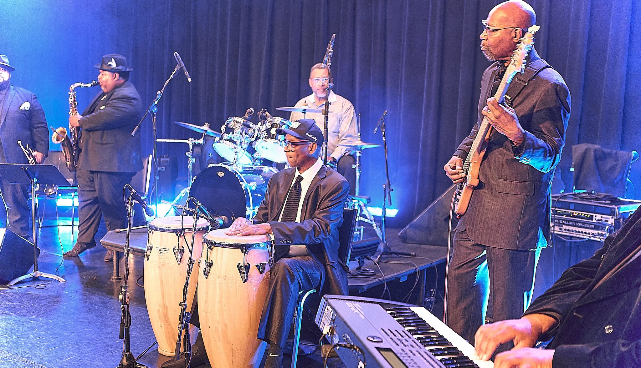 Bob Beamon: From Olympian to Jazz Musician A photo shows Olympic legend Bob Beamon performing onstage with his bongos