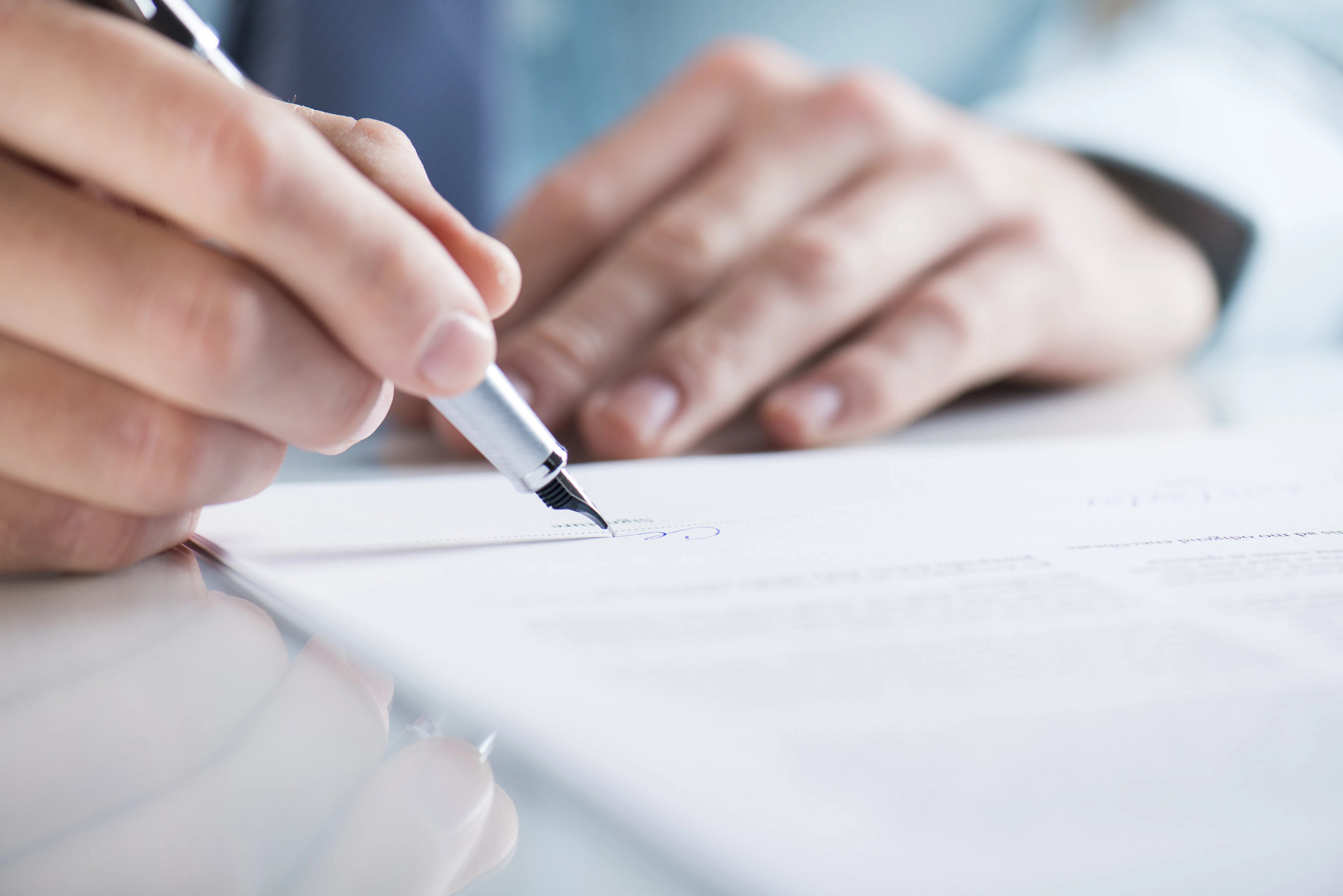 business man signing contract