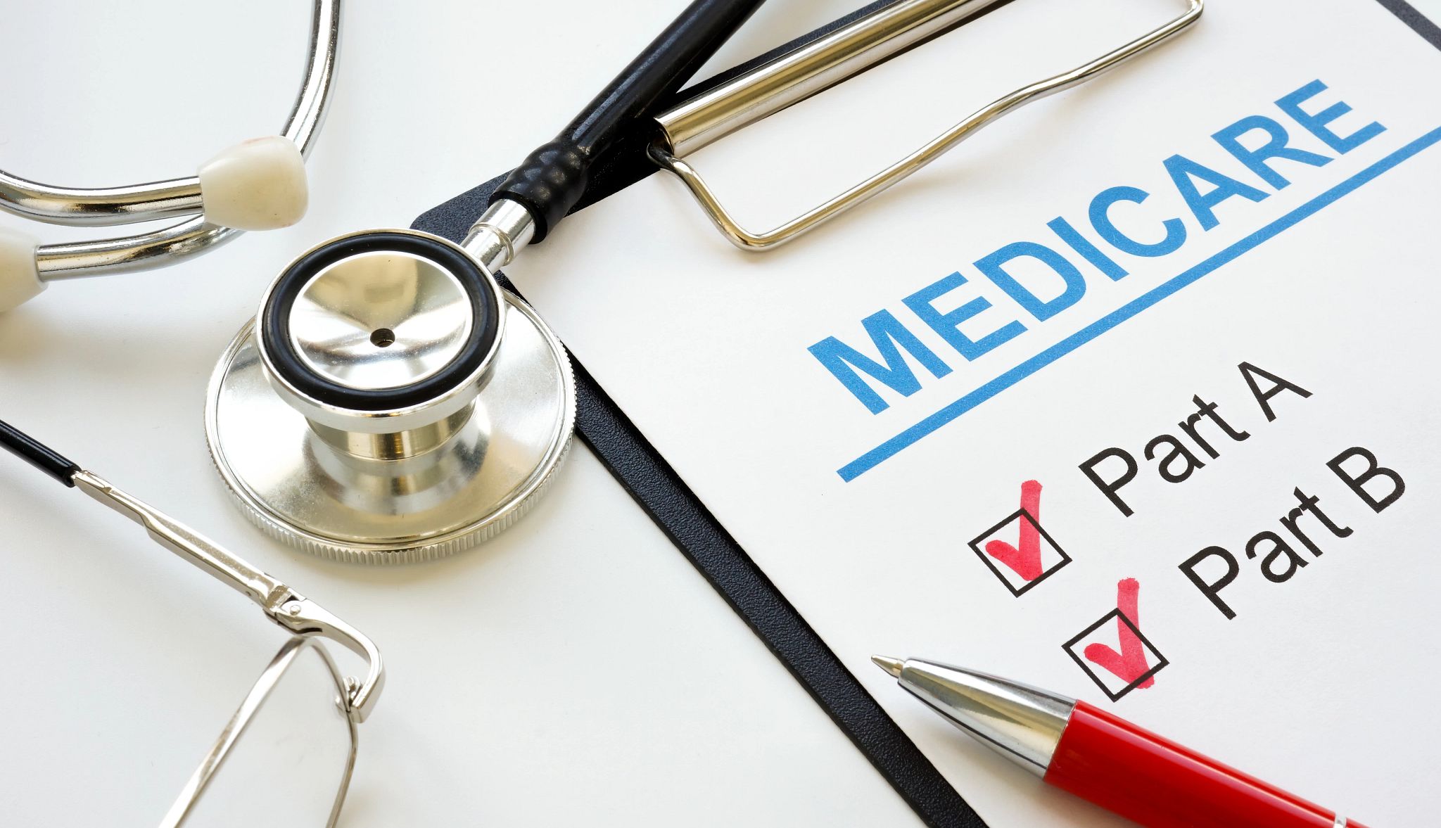 Medicare application form with marked plan A and B.
