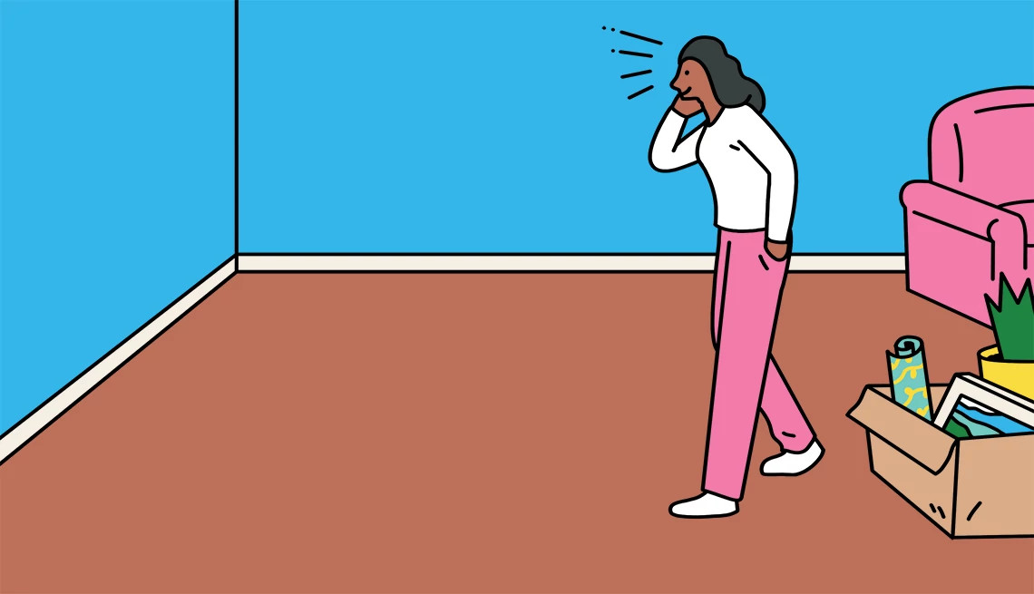 a person thinking about decorating their empty walls