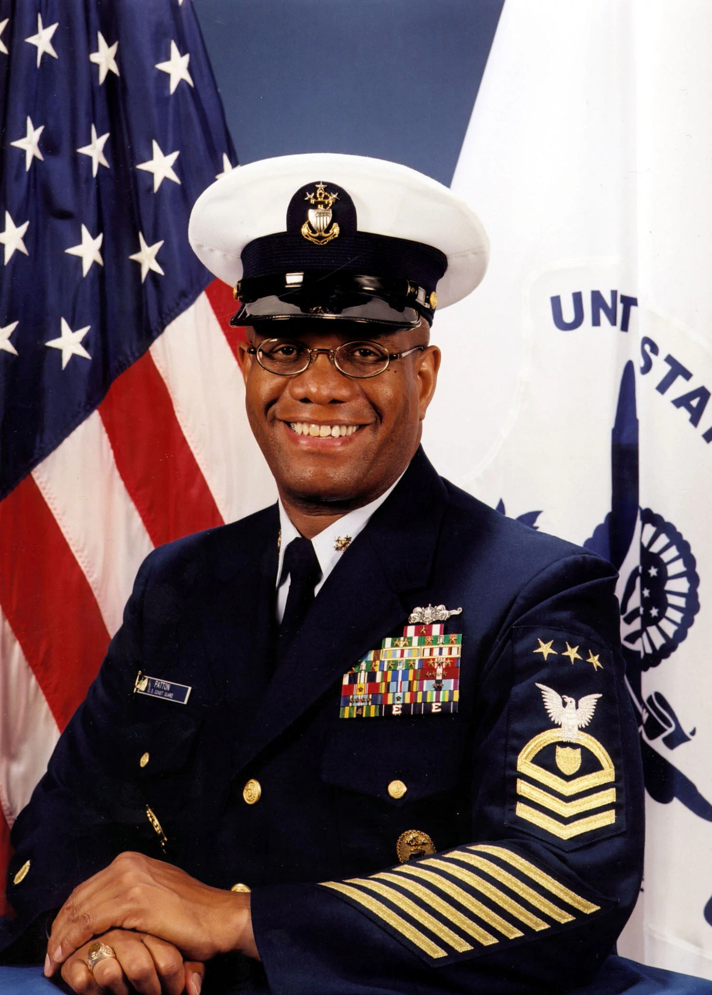 vince patton posing for a portrait in his coast guard dress uniform