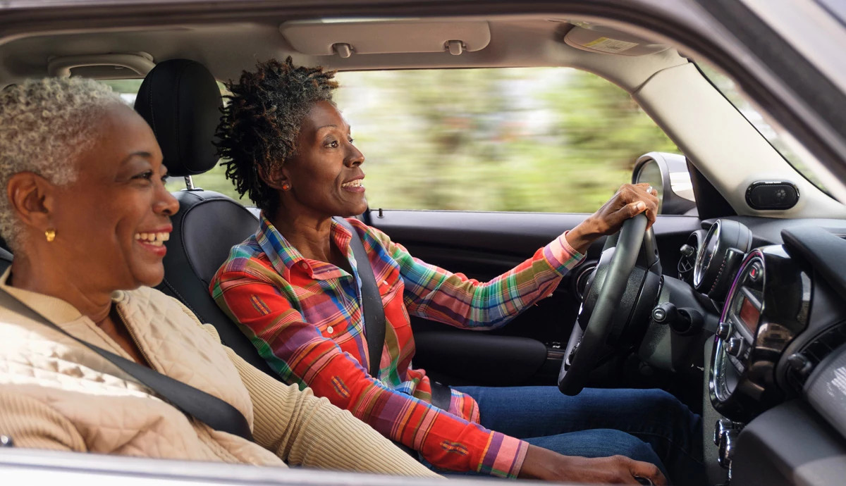 Two women driving in car