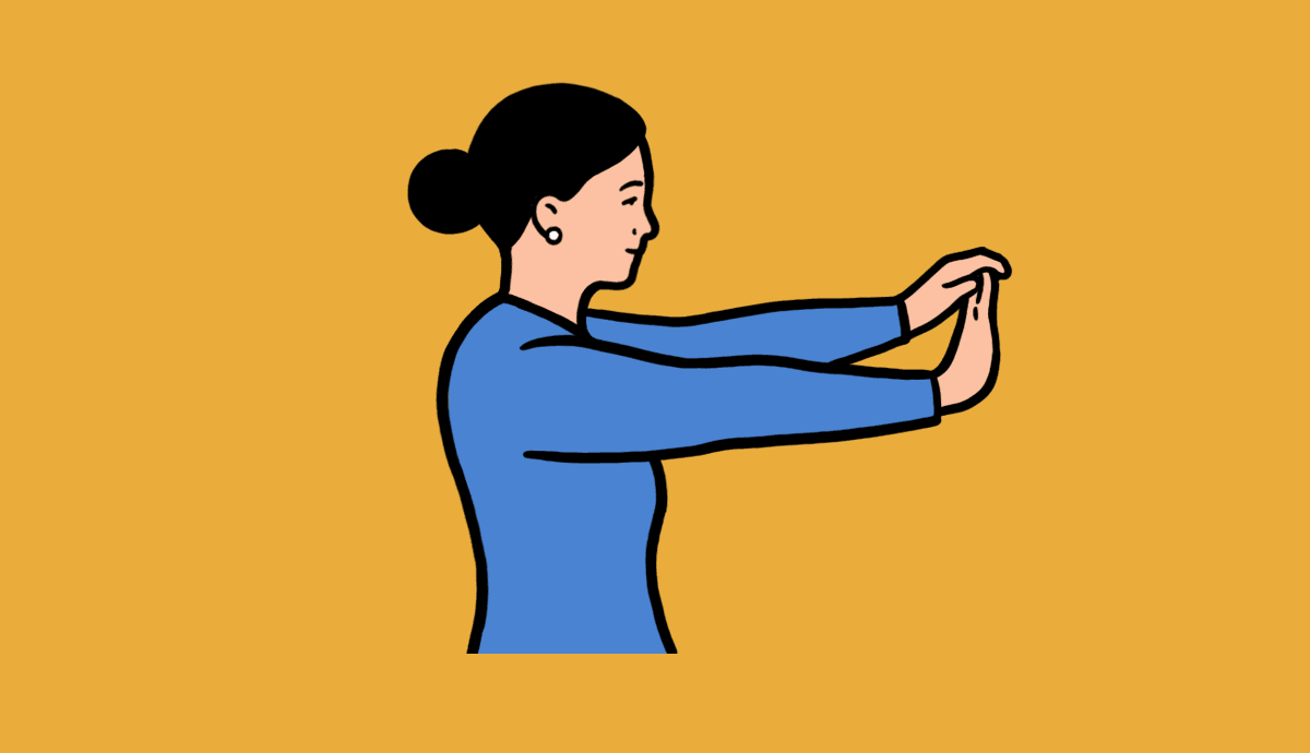 A woman extends her arm in front of her, grasping the fingers of one hand with the other hand and pulling the fingers back.