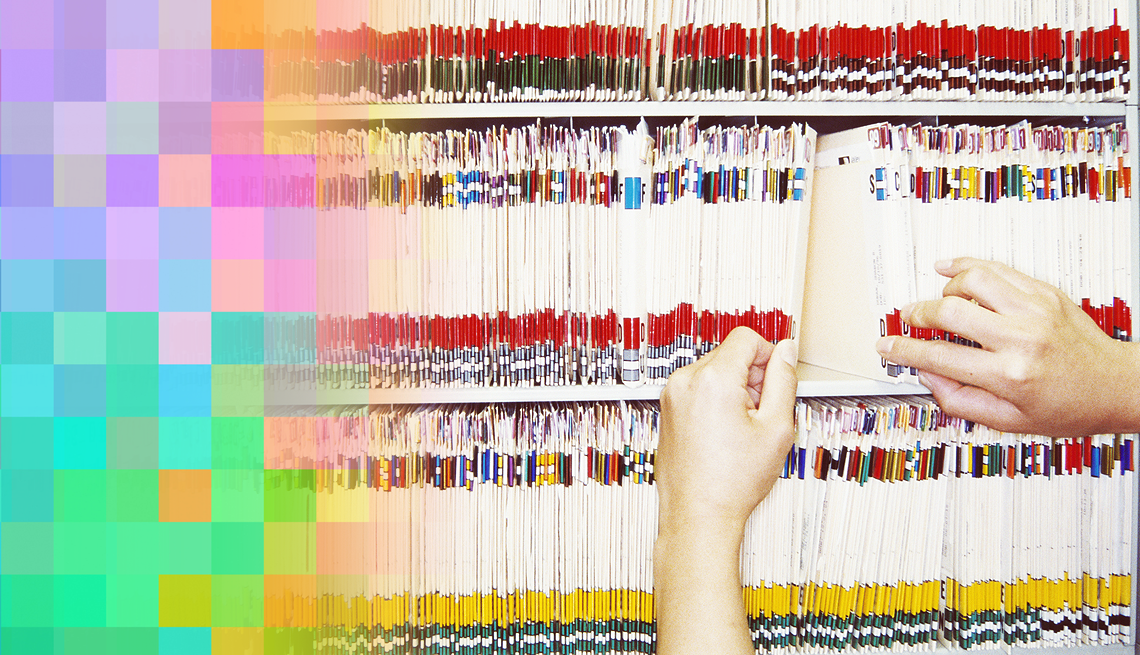 What to know about medical privacy hands flip through folders of medical records