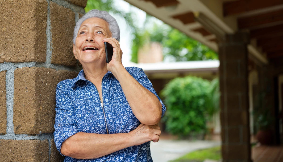 woman smiling on phone