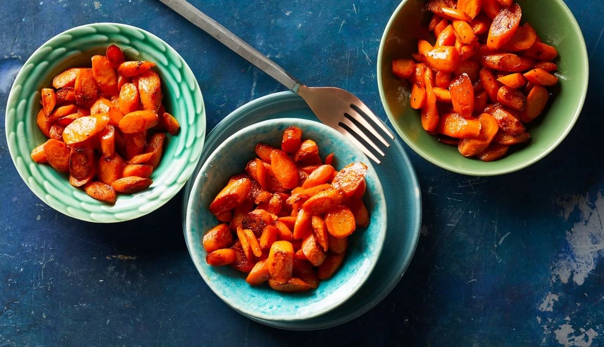 Maple roasted carrots An overhead view of maple roasted carrots in bowls