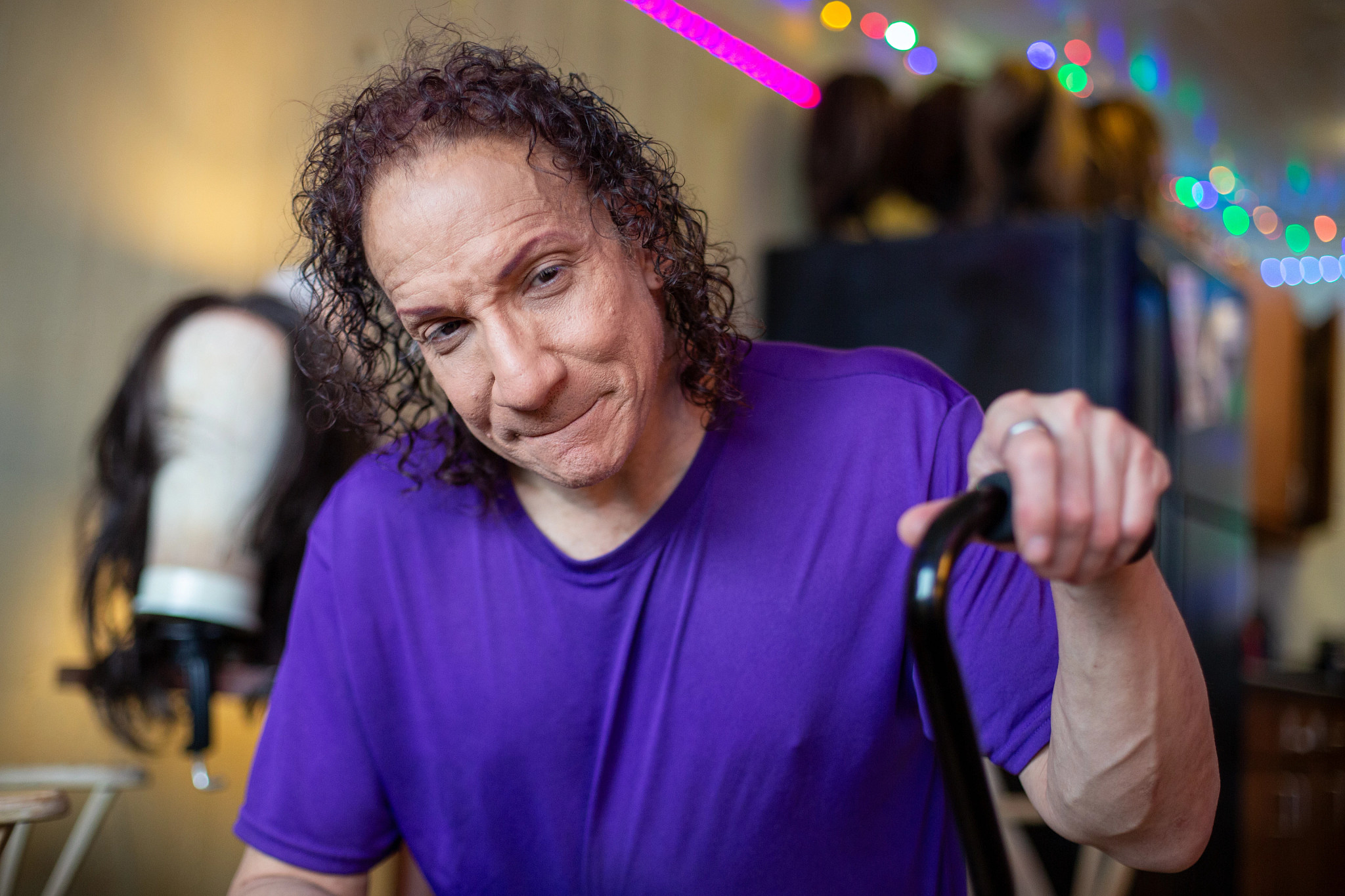 a person holding a cane