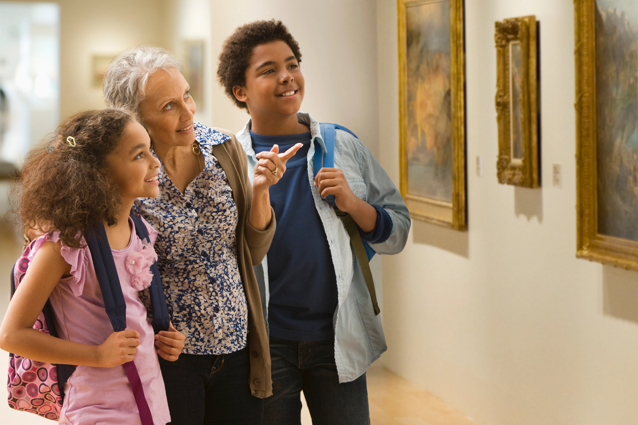 A Grandmother and her grandchildren visiting a museum