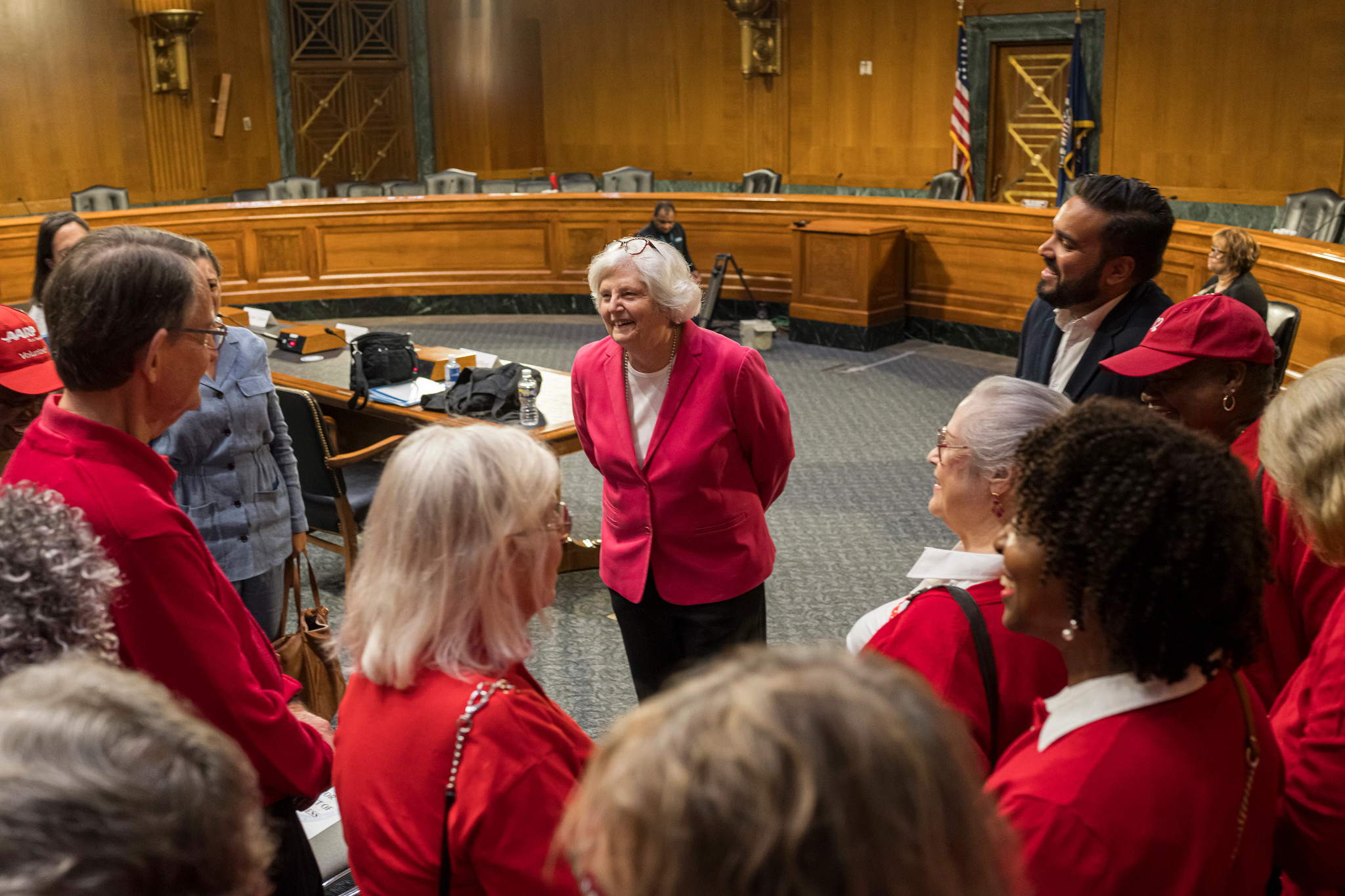people talking after a hearing