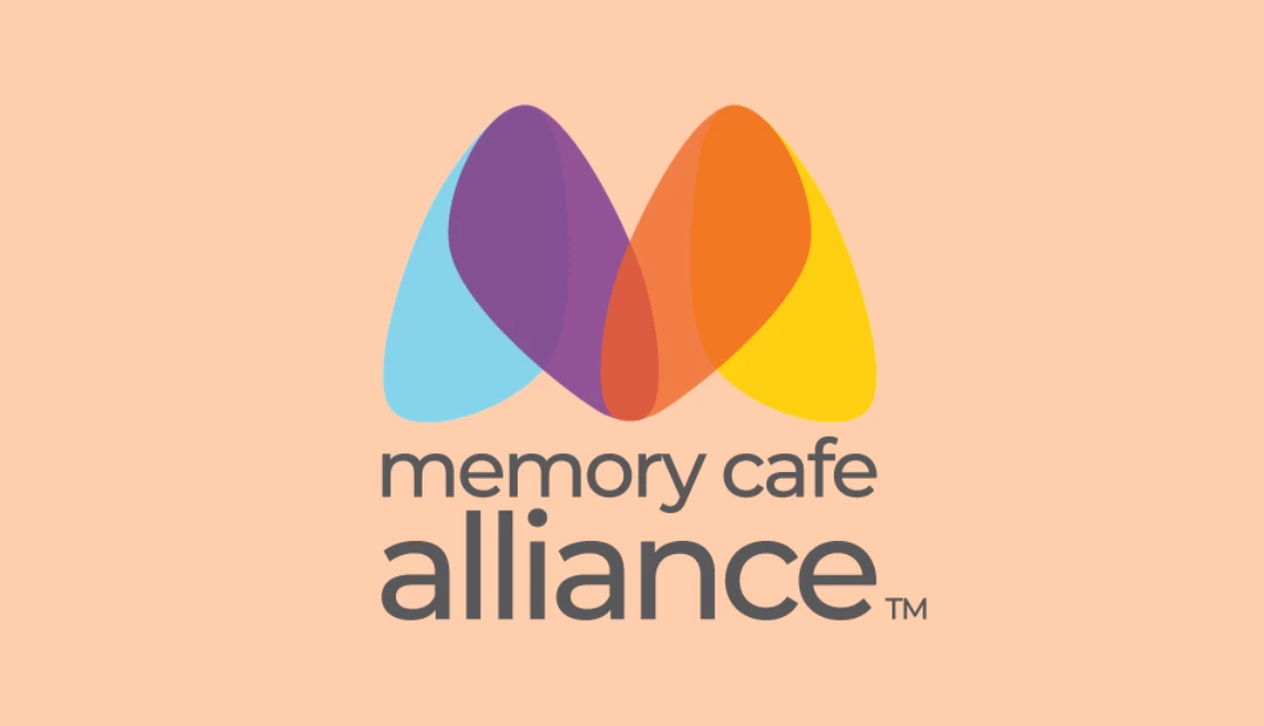 The Memory Cafe Alliance logo with the text "memory cafe alliance"