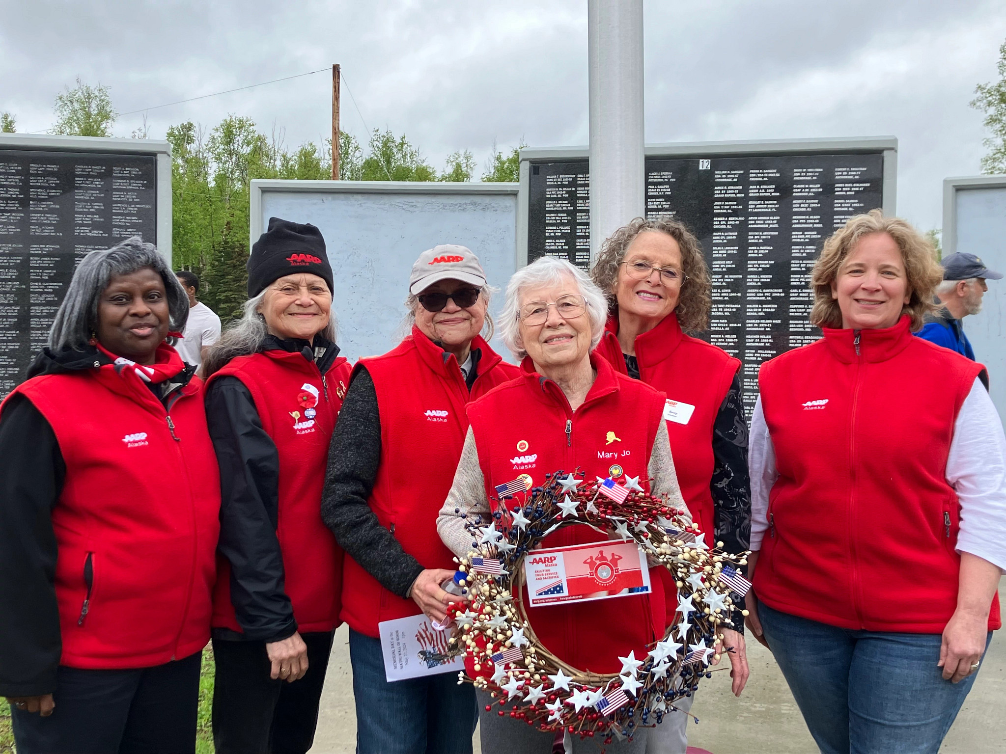 Volunteers Smokey, Gina, Linda, Mary Jo, Betsy and Kay at the Wasilla Armed Services Memorial Wall in May