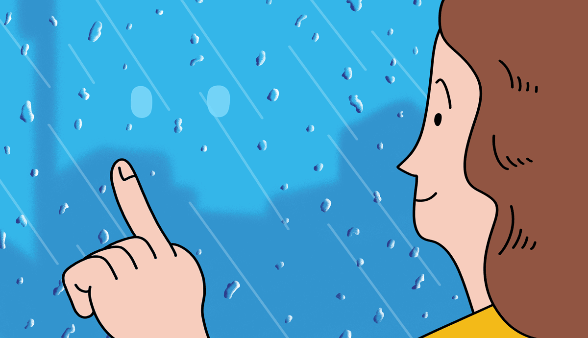 A gif shows a woman drawing a smiley face onto a rain-drenched window with her finger