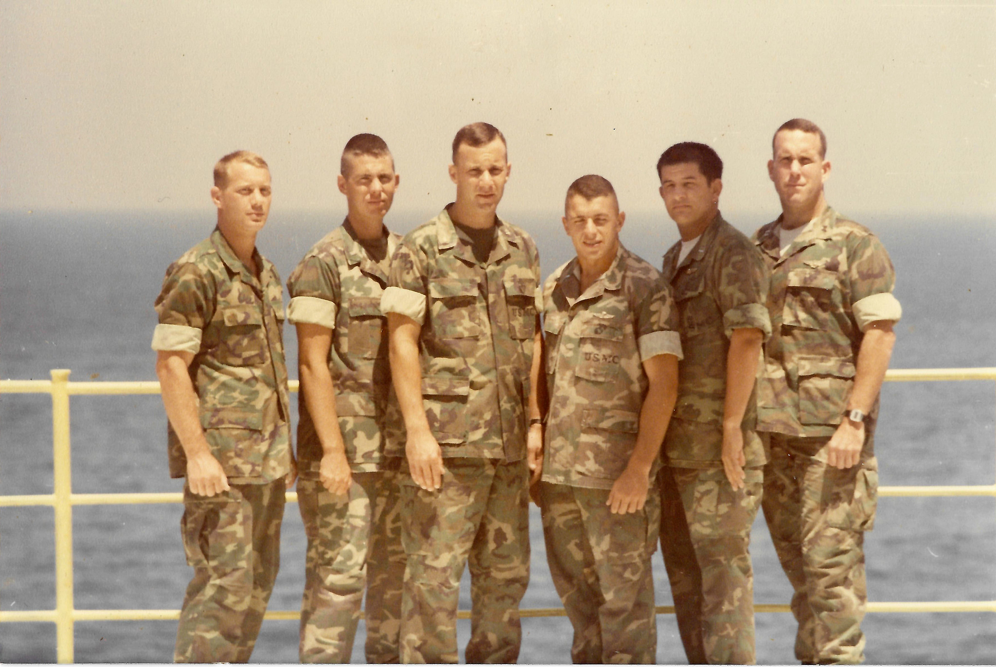 a group of u s marines in posing for a group photo in uniform