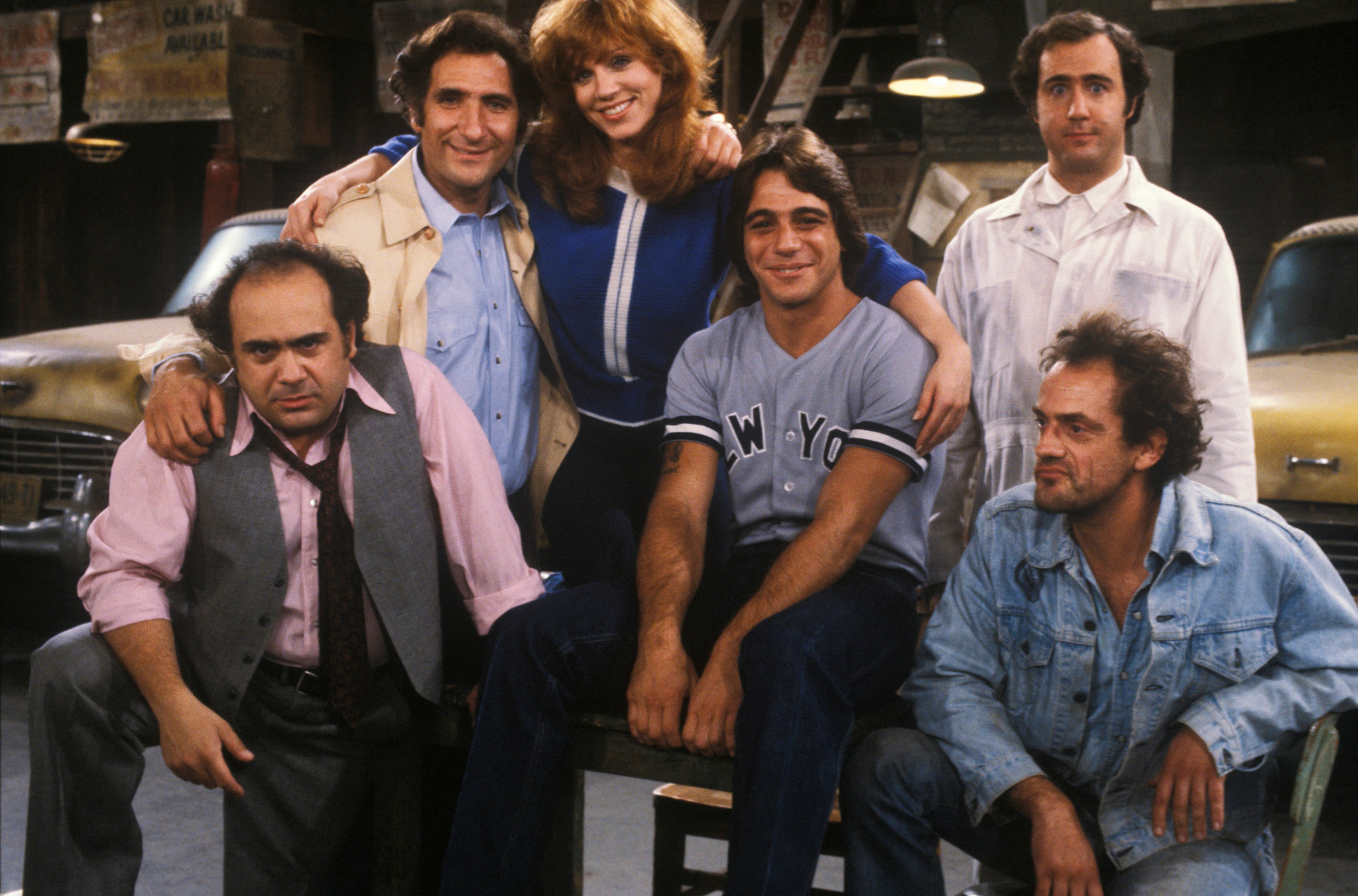 tony danza posing for a group portrait with the cast of taxi