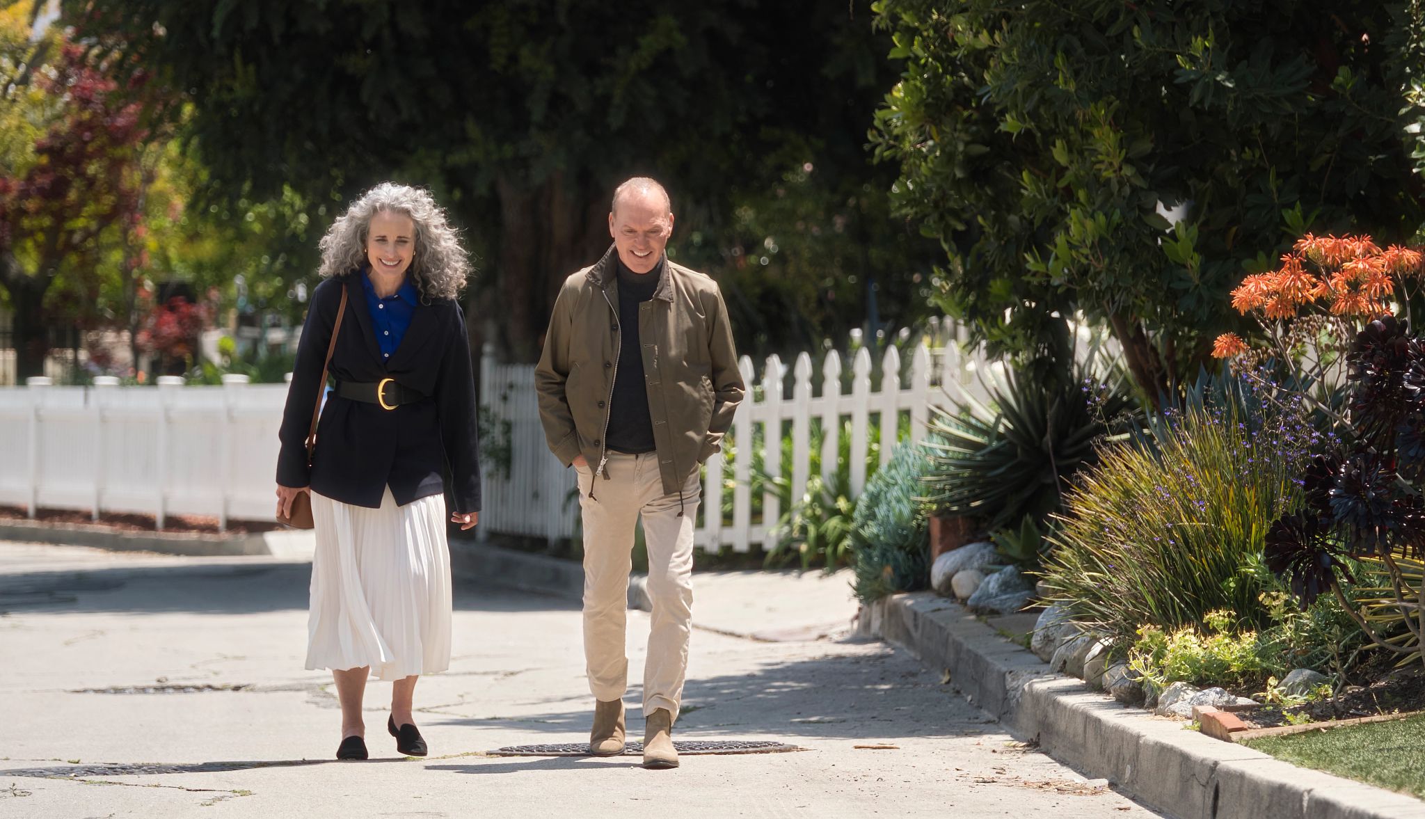 Andie MacDowell stars in 'Goodrich' Andie MacDowell and Michael Keaton walking on street