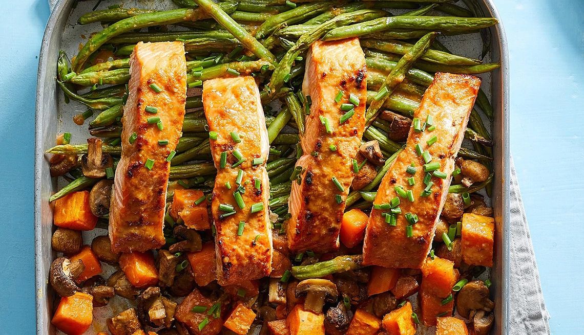 https://aarp.widen.net/content/gimuyqmzmb/jpeg/1140-ginger-tahini-salmon-vegetables.jpg?crop=true&anchor=0,0&q=80&color=ffffffff&u=xp0vsk&w=1140&h=655 https://aarp.widen.net/content/gimuyqmzmb/jpeg/1140-ginger-tahini-salmon-vegetables.jpg?crop=true&anchor=0,0&q=80&color=ffffffff&u=xp0vsk&w=1140&h=655
