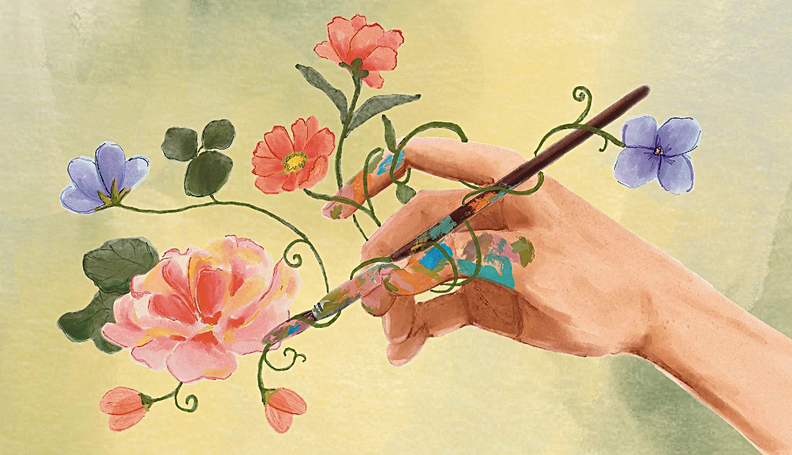 Illustration shows a hand using a paintbrush to bring colorful flowers and flowing green vines
